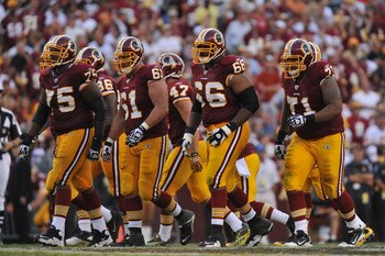 LANDOVER - SEPTEMBER 19:  The Washington Redskins offense walks up to the line of scrimmage during the game against the Houston Texans at FedExField on September 19, 2010 in Landover, Maryland. The Texans defeated the Redskins in overtime 30-27. (Photo by
