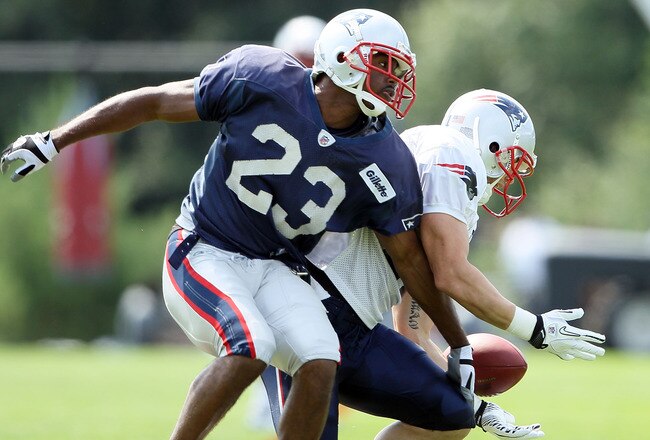 FOXBORO, MA - AUGUST 02:  Leigh Bodden #23 breaks up a pass intended for Julian Edelman #11 during the New England Patriots training camp on August 2, 2010 at Gillette Stadium in Foxboro, Massachusetts.  (Photo by Elsa/Getty Images)