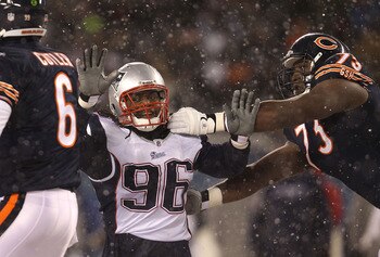 CHICAGO - DECEMBER 12: Jermaine Cunningham #96 of the New England Patriots rushes past J'Marcus Webb #73 of the Chicago Bears towards Jay Cutler #6 at Soldier Field on December 12, 2010 in Chicago, Illinois. The Patriots defeated the Bears 36-7. (Photo by