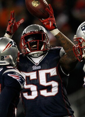 FOXBORO, MA - DECEMBER 06:  (L-R) Devin McCourty #32, Brandon Spikes #55 and Vince Wilfork #75 of the New England Patriots celebrate after McCourty intercepted a pass in the third quarter against the New York Jets at Gillette Stadium on December 6, 2010 i