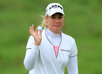 SOUTHPORT, ENGLAND - JULY 31:  Brittany Lincicome of the USA acknowledges the crowd on the 18th green during the third round of the 2010 Ricoh Women's British Open at Royal Birkdale on July 31, 2010 in Southport, England.  (Photo by David Cannon/Getty Ima