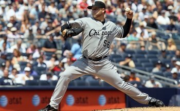 NEW YORK - MAY 02:  Mark Buehrle #56 of the Chicago White Sox delivers a pitch against the New York Yankees on May 2, 2010 at Yankee Stadium in the Bronx borough of New York City. The Yankees defeated the White Sox 12-3.  (Photo by Jim McIsaac/Getty Image