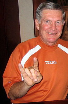 220px-mack_brown_texas_horns_up2_display_image