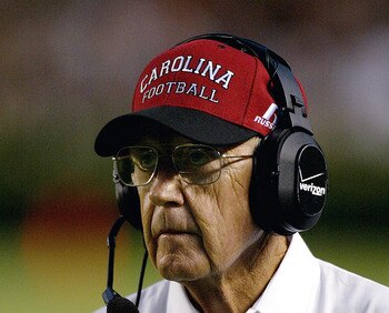 COLUMBIA, SC - SEPTEMBER 11:  Head coach of the South Carolina Gamecocks Lou Holtz checks the scoreboard during their game against the Georgia Bulldogs at Williams-Brice Stadium on September 11, 2004 in Columbia, South Carolina. (Photo by Streeter Lecka/G