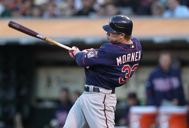 OAKLAND, CA - JUNE 04:  Justin Morneau #33 of the Minnesota Twins bats against the Oakland Athletics during an MLB game at the Oakland-Alameda County Coliseum on June 4, 2010 in Oakland, California.  (Photo by Jed Jacobsohn/Getty Images)