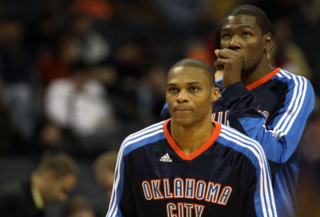 CHARLOTTE, NC - DECEMBER 21:  Teammates Kevin Durant #35 and Russell Westbrook #0 of the Oklahoma Thunder warmup before the start of their game against the Charlotte Bobcats at Time Warner Cable Arena on December 21, 2010 in Charlotte, North Carolina. NOT