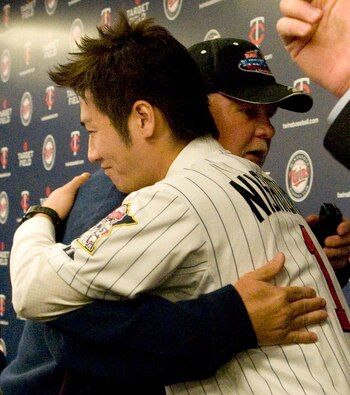 MINNEAPOLIS, MN - DECEMBER 18: Tsuyoshi Nishioka #1 of the Minnesota Twins hugs manager Ron Gardenhire following a press conference on December 18, 2010 at Target Field in Minneapolis, Minnesota. (Photo by Hannah Foslien /Getty Images)