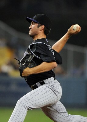LOS ANGELES, CA - SEPTEMBER 17:  Huston Street #16 of the Colorado Rockies pitches against the Los Angeles Dodgers at Dodger Stadium on September 17, 2010 in Los Angeles, California.  (Photo by Lisa Blumenfeld/Getty Images)