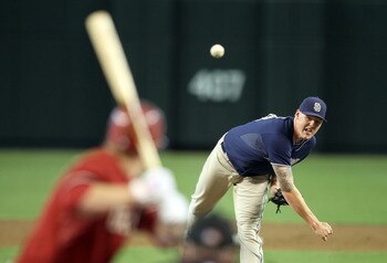 PHOENIX - SEPTEMBER 01:  Starting pitcher Mat Latos #38 of the San Diego Padres pitches against the Arizona Diamondbacks during the Major League Baseball game at Chase Field on September 1, 2010 in Phoenix, Arizona. The Diamondbacks defeated the Padres 5-