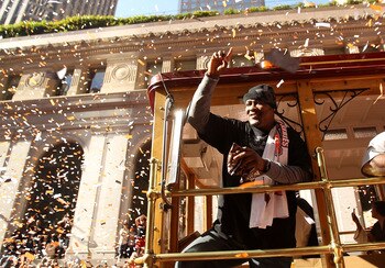 SAN FRANCISCO - NOVEMBER 03:  Juan Uribe of the San Francisco Giants waves to the crowd during the San Francisco Giants victory parade on November 3, 2010 in San Francisco, California.  (Photo by Ezra Shaw/Getty Images)