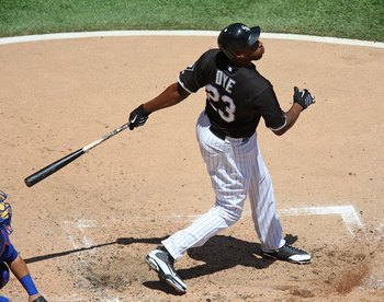 CHICAGO - JUNE 28: Jermaine Dye #23 of the Chicago White Sox follows through after hitting the ball against the Chicago Cubs on June 28, 2009 at U.S. Cellular Field in Chicago, Illinois. The White Sox defeated the Cubs 6-0. (Photo by Jonathan Daniel/Getty