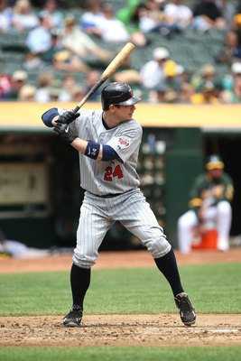 OAKLAND, CA - JUNE 11:  Joe Crede #24 of the Minnesota Twins bats against the Oakland Athletics during a Major League Baseball game on June 11, 2009 at the Oakland Coliseum in Oakland, California.  (Photo by Jed Jacobsohn/Getty Images)