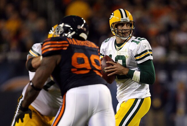 CHICAGO - SEPTEMBER 27:  Aaron Rodgers #12 of the Green Bay Packers drops back to pass against the Chicago Bears at Soldier Field on September 27, 2010 in Chicago, Illinois. The Bears won 20-17.  (Photo by Jonathan Daniel/Getty Images)