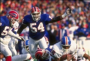 12 Jan 1992:  Linebacker Carlton Bailey of the Buffalo Bills works against the Denver Broncos during a playoff game at Rich Stadium in Orchard Park, New York.  The Bills won the game, 10-7. Mandatory Credit: Rick Stewart  /Allsport