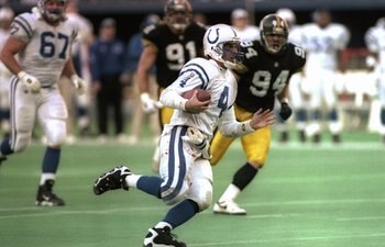 14 Jan 1996:  Quarterback Jim Harbaugh of the Indianapolis Colts moves the ball during a playoff game against the Pittsburgh Steelers at Three Rivers Stadium in Pittsburgh, Pennsylvania.  The Steelers won the game, 20-16. Mandatory Credit: Rick Stewart  /
