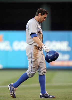 ANAHEIM, CA - JULY 02:  Scott Podsednik #22 of the Kansas City Royals leaves the field after he is doubled off second base against the Los Angeles Angels during the first inning at Angel Stadium on July 2, 2010 in Anaheim, California.  (Photo by Harry How