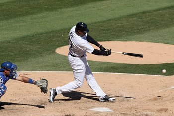 CHICAGO - APRIL 7:  Jermaine Dye #23 of the Chicago White Sox swings at the pitch against the Kansas City Royals during the Opening Day game on April 7, 2009 at U.S. Cellular Field in Chicago, Illinois. (Photo by Jonathan Daniel/Getty Images)