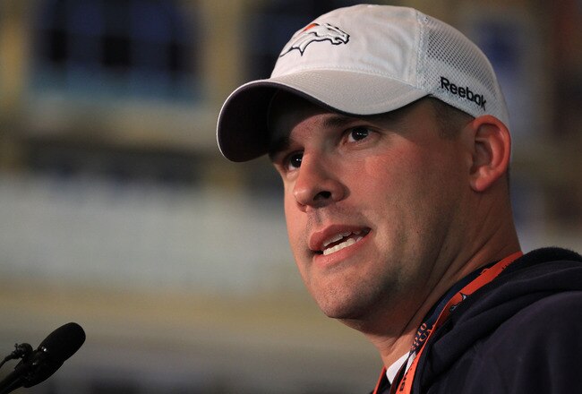 LONDON, ENGLAND - OCTOBER 29:  Head coach of the Denver Broncos Josh McDaniels speaks to the media during a press conference prior to the start of a team training session at The Brit Oval on October 29, 2010 in London, England. The Denver Broncos will pla