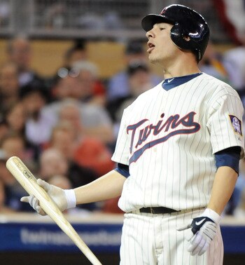 MINNEAPOLIS, MN - OCTOBER 7: Danny Valencia #19 of the Minnesota Twins reacts to a called third strike in the seventh inning during game two of the ALDS game against the New York Yankees on October 7, 2010 at Target Field in Minneapolis, Minnesota. (Photo