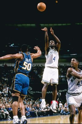 1 Apr 1997:  Guard Michael Finley of the Dallas Mavericks shoots the ball over the head of forward Otis Thorpe of the Detroit Pistons at Reunion Arena in Dallas, Texas.  The Pistons won the game 100-82.  Mandatory Credit: Stephen Dunn  /Allsport
