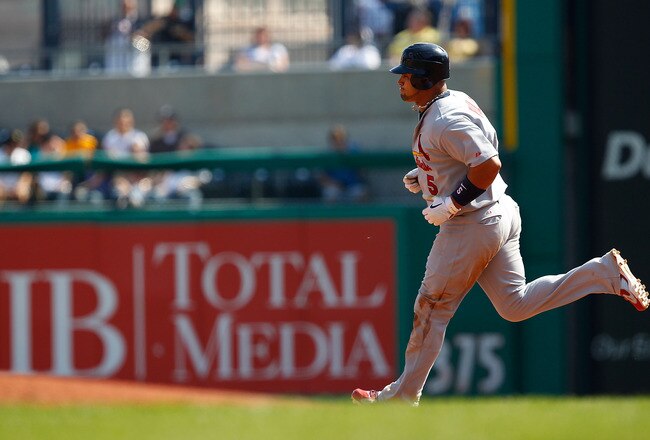 PITTSBURGH - SEPTEMBER 23:  Albert Pujols #5 of the St Louis Cardinals rounds the bases after hitting his second home run of the game against the Pittsburgh Pirates during the game on September 23, 2010 at PNC Park in Pittsburgh, Pennsylvania.  (Photo by