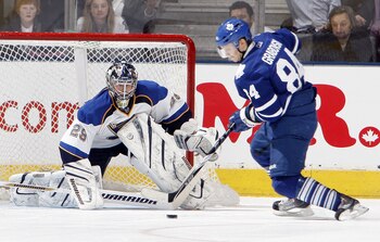 TORONTO, CANADA - JANUARY 6: Mikhail Grabovski #84 of the Toronto Maple Leafs scores on Ty Conklin #29 of the St. Louis Blues during the shootout at the Air Canada Centre January 6, 2011 in Toronto, Ontario, Canada. (Photo by Abelimages/Getty Images)