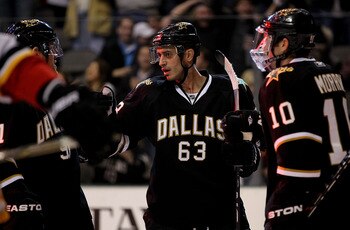 DALLAS, TX - DECEMBER 23:   Center Mike Ribeiro #63 of the Dallas Stars celebrates his power play goal against the Calgary Flames at American Airlines Center on December 23, 2010 in Dallas, Texas.  (Photo by Ronald Martinez/Getty Images)