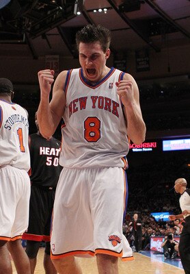 NEW YORK, NY - DECEMBER 17:  Danilo Gallinari #8 of the New York Knicks celebrates knocking the ball out of the hands of LeBron James #6 of the Miami Heat at Madison Square Garden on December 17, 2010 in New York City. NOTE TO USER: User expressly acknowl