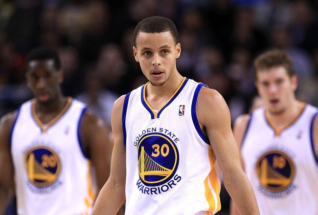 OAKLAND, CA - JANUARY 19:  Stephen Curry #30 of the Golden State Warriors walks back down the court after the Warriors were called for a offensive foul during their game against the Indiana Pacers at Oracle Arena on January 19, 2011 in Oakland, California