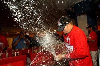 PHILADELPHIA - OCTOBER 21:  Joe Blanton #56 of the Philadelphia Phillies sprays champagne as they celebrate defeating the Los Angeles Dodgers 10-4 to advance to the World Series in Game Five of the NLCS during the 2009 MLB Playoffs at Citizens Bank Park o