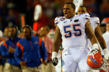 MIAMI - JANUARY 08: Mike Pouncey #55 of the Florida Gators reacts after a play against the Oklahoma Sooners in the FedEx BCS National Championship Game at Dolphin Stadium on January 8, 2009 in Miami, Florida.  (Photo by Eliot J. Schechter/Getty Images)