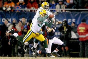 CHICAGO, IL - JANUARY 23:  Sam Shields #37 of the Green Bay Packers intercepts the game's final pass to seal the 21-14 victory for the Packers against the Chicago Bears in the NFC Championship Game at Soldier Field on January 23, 2011 in Chicago, Illinois