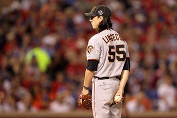 ARLINGTON, TX - NOVEMBER 01:  Tim Lincecum #55 of the San Francisco Giants gets set to throw a pitch against the Texas Rangers in Game Five of the 2010 MLB World Series at Rangers Ballpark in Arlington on November 1, 2010 in Arlington, Texas. The Giants w