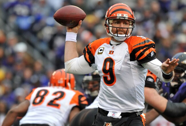 BALTIMORE, MD - JANUARY 2:  Carson Palmer #9 of the Cincinnati Bengals passes against the Baltimore Ravens at M&T Bank Stadium on January 2, 2011 in Baltimore, Maryland. The Ravens lead the Bengals 6-0 at the half. (Photo by Larry French/Getty Images)