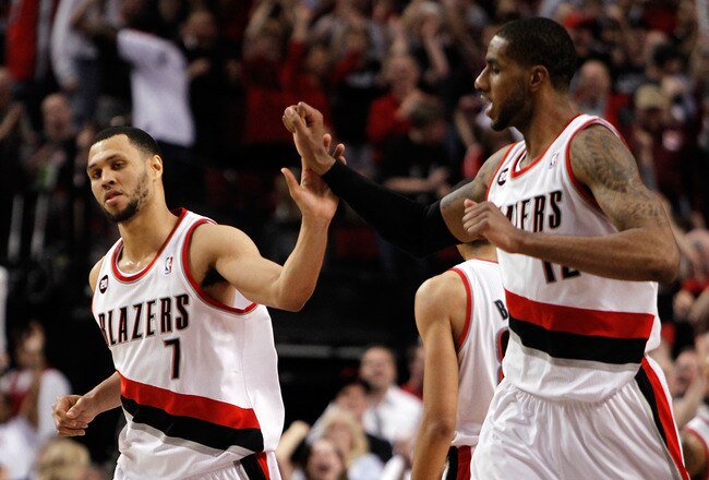 PORTLAND, OR - APRIL 23:  Brandon Roy #7 high fives LaMarcus Aldridge #12 of the Portland Trail Blazers against the Dallas Mavericks in Game Four of the Western Conference Quarterfinals in the 2011 NBA Playoffs on April 23, 2011 at the Rose Garden in Port
