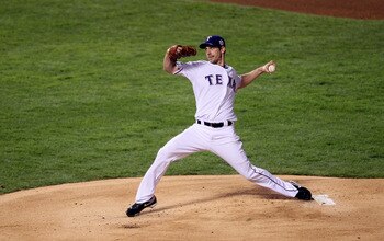ARLINGTON, TX - NOVEMBER 01:  Cliff Lee #33 of the Texas Rangers pitches against the San Francisco Giants in Game Five of the 2010 MLB World Series at Rangers Ballpark in Arlington on November 1, 2010 in Arlington, Texas.  (Photo by Elsa/Getty Images)