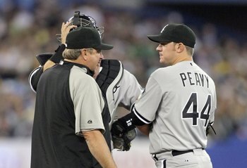 TORONTO - APRIL 12: Jake Peavy #44 of the Chicago White Sox listens to the pitching Don Cooper against the Toronto Blue Jays during their MLB game at the Rogers Centre on April 12, 2010 in Toronto, Ontario. (Photo By Dave Sandford/Getty Images)