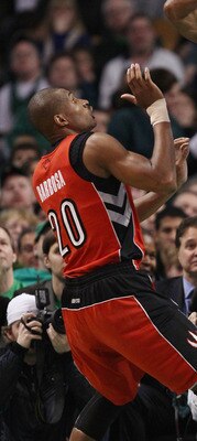 BOSTON, MA - JANUARY 07:  Ray Allen #20 of the Boston Celtics passes the ball as Leandro Barbosa #20 of the Toronto Raptors defends on January 7, 2011 at the TD Garden in Boston, Massachusetts. The Celtics defeated the Raptors 122-102. NOTE TO USER: User