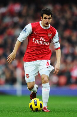 LONDON, UNITED KINGDOM - JANUARY 22:  Cesc Fabregas of Arsenal runs with the ball during the Barclays Premier League match between Arsenal and Wigan Athletic at the Emirates Stadium on January 22, 2011 in London, England.  (Photo by Mike Hewitt/Getty Imag