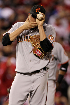 PHILADELPHIA - OCTOBER 23:  Jonathan Sanchez #57 of the San Francisco Giants reacts to giving up a first inning RBI double to Chase Utley of the Philadelphia Phillies in Game Six of the NLCS during the 2010 MLB Playoffs at Citizens Bank Park on October 23