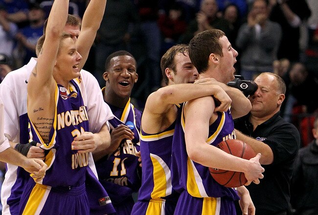 OKLAHOMA CITY - MARCH 20:  (L-R) Marc Sonnen #23, Kwadzo Ahelegbe #11, Ali Farokhmanesh #5 and Johnny Moran #13 of the Northern Iowa Panthers celebrate after they won 69-67 against the Kansas Jayhawks during the second round of the 2010 NCAA men's basketb
