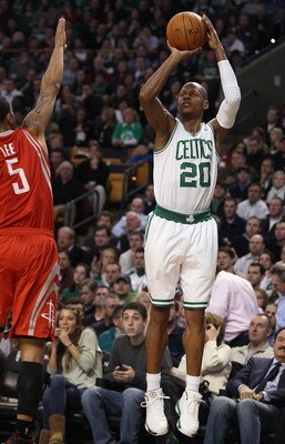 BOSTON, MA - JANUARY 10:  Ray Allen #30 of the Boston Celtics shoots a three point shot as Courtney Lee #5 of the Houston Rockets defends on January 10, 2011 at the TD Garden in Boston, Massachusetts.  NOTE TO USER: User expressly acknowledges and agrees 