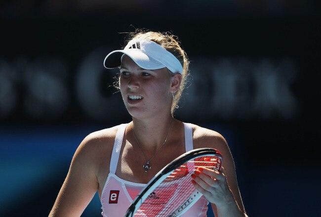 MELBOURNE, AUSTRALIA - JANUARY 27:  Caroline Wozniacki of Denmark looks on in her semifinal match against Na Li of China during day eleven of the 2011 Australian Open at Melbourne Park on January 27, 2011 in Melbourne, Australia.  (Photo by Clive Brunskil