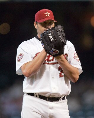 HOUSTON - SEPTEMBER 20: Pitcher Roger Clemens #22 of the Houston Astros lines up a pitch during his final scheduled home game of the season against the Cincinnati Reds on September 20, 2006 at Minute Maid Park in Houston, Texas. (Photo by Ronald Martinez/
