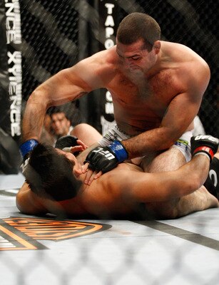 MONTREAL- MAY 8: Mauricio 'Shogun' Rua (top) punches Lyoto Machida in their light heavyweight bout at UFC 113 at Bell Centre on May 8, 2010 in Montreal, Quebec, Canada.  (Photo by Richard Wolowicz/Getty Images)