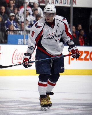TORONTO, CANADA - JANUARY 22:  Alex Ovechkin #8 of the Washington Capitals skates up the ice during game action at the Air Canada Centre against the Toronto Maple Leafs January 22, 2011 in Toronto, Ontario, Canada. (Photo by Abelimages/Getty Images)