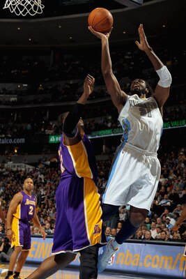 Nene too often weakly tries to finish at the hoop instead of dunking.
