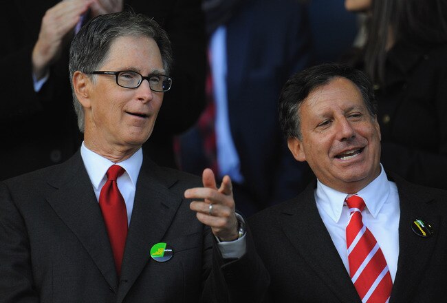 LIVERPOOL, ENGLAND - OCTOBER 17: New Liverpool co-owners John W Henry (L) and NESV Chairman Tom Werner look on during the Barclays Premier League match between Everton and Liverpool at Goodison Park on October 17, 2010 in Liverpool, England.  (Photo by Mi
