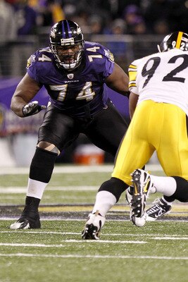 BALTIMORE, MD - DECEMBER 05:  Michael Oher #74 of the Baltimore Ravens blocks James Harrison #92 of the Pittsburgh Steelers at M&T Bank Stadium on December 5, 2010 in Baltimore, Maryland.  (Photo by Geoff Burke/Getty Images)