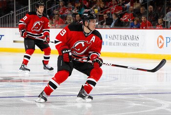 NEWARK, NJ - OCTOBER 23:  Zach Parise #9 of the New Jersey Devils skates against the Buffalo Sabres on October 23, 2010 at the Prudential Center in Newark, New Jersey. Sabres defeated the Devils 6-1.  (Photo by Mike Stobe/Getty Images)